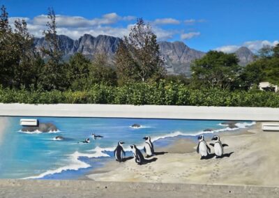 penguins on the beach mural overlooking Cape mountains, as painted by Designer Brushworx